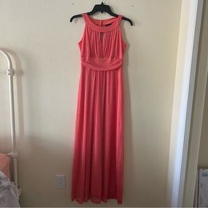 Long beautiful sparkly coral dress with key hole in the front and back. Size 6